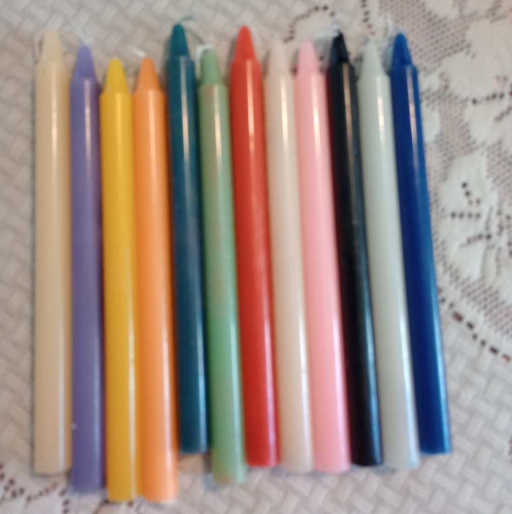 Set of different color spiritual taper candles , 12 candles in all